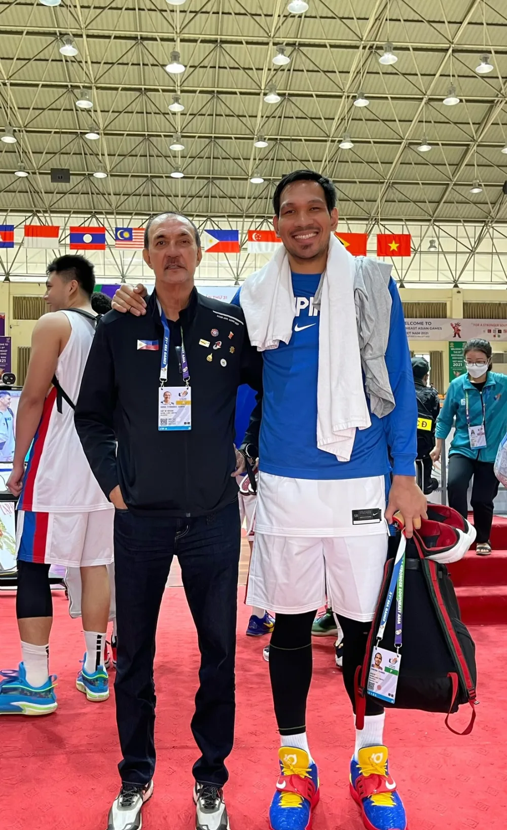 Ramon Fernandez with a Philippine basketball player at the SEA Games